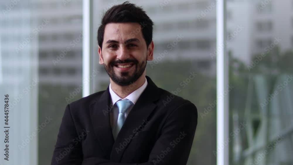 Smiling professional businessman. Happy confident handsome smart young adult entrepreneur, leader, manager posing in the office. Close-up face view business portrait. Smiling professional businessman. Happy confident handsome smart young adult entrepreneur, leader, manager posing in the office. Close-up face view business portrait.