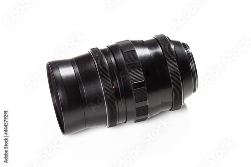 black old vintage camera lens on a white background.