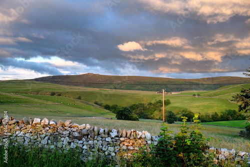 A sunset view looking towards, Ewe Close Scar in Hartlington , in the Yorkshire Dales, North Yorkshire. photo