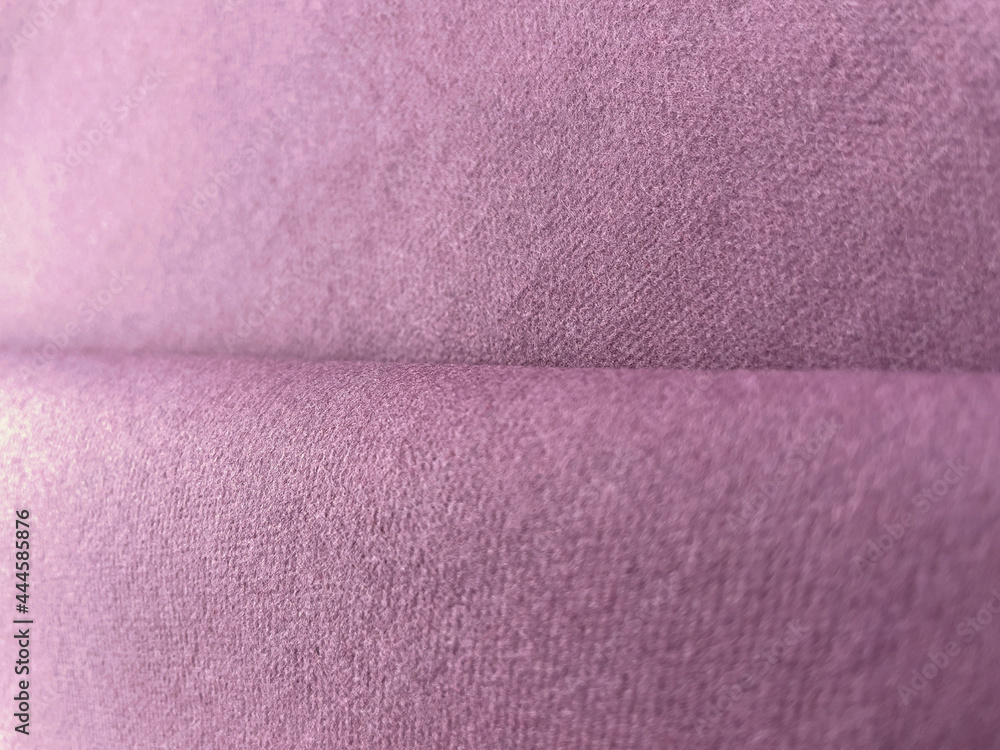 Purple color canvas texture folded fabric background Purple color canvas texture folded fabric background