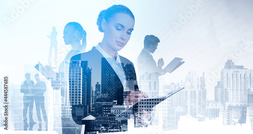 Silhouettes of business people who are working with documents. Panoramic New York city view with downtown skyscrapers. Law firm and corporate lifestyle concept. Double exposure photo