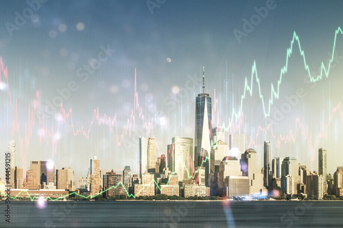 Abstract virtual financial graph hologram on New York skyline background, forex and investment concept. Multiexposure