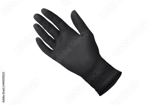 Medical nitrile gloves.Two black surgical gloves isolated on white background with hands. Rubber glove manufacturing, human hand is wearing a latex glove. Doctor or nurse putting on protective gloves