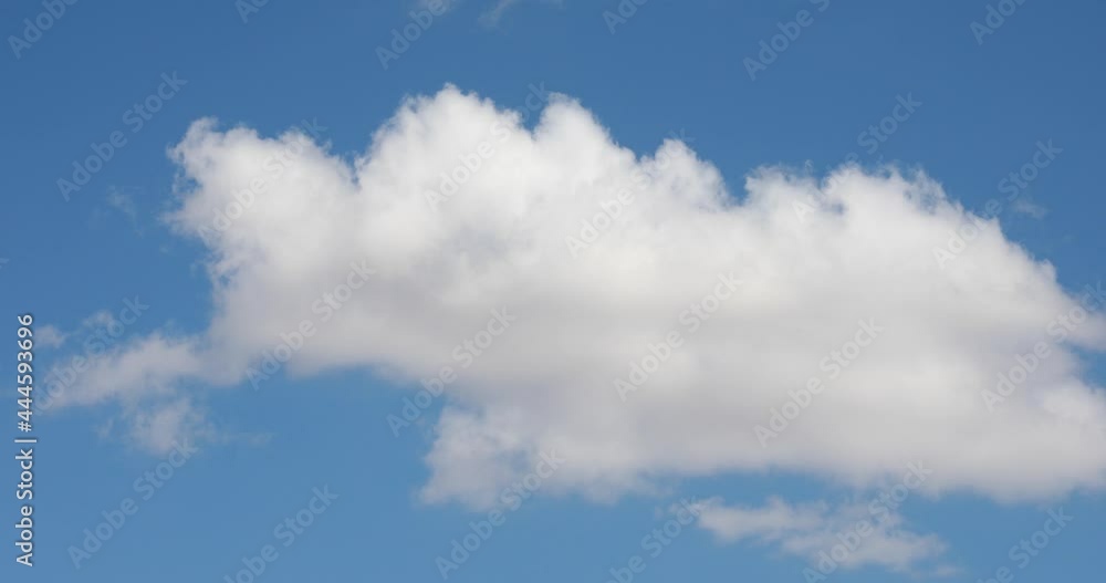 Summer blue sky time lapse. Nature weather blue sky. White clouds background. Cloud time lapse nature background. Blue sky white clouds. Puffy fluffy white clouds. Cumulus cloud cloudscape time-lapse Summer blue sky time lapse. Nature weather blue sky. White clouds background. Cloud time lapse nature background. Blue sky white clouds. Puffy fluffy white clouds. Cumulus cloud cloudscape time-lapse