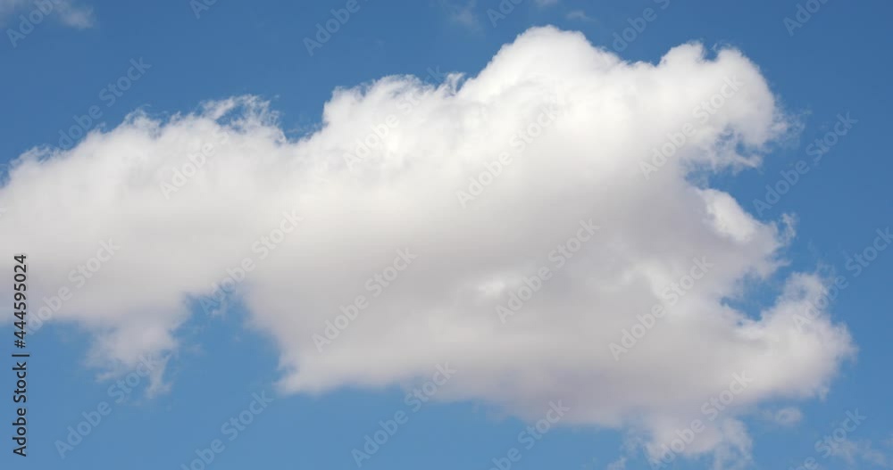 Summer blue sky time lapse. Nature weather blue sky. White clouds background. Cloud time lapse nature background. Blue sky white clouds. Puffy fluffy white clouds. Cumulus cloud cloudscape time-lapse Summer blue sky time lapse. Nature weather blue sky. White clouds background. Cloud time lapse nature background. Blue sky white clouds. Puffy fluffy white clouds. Cumulus cloud cloudscape time-lapse