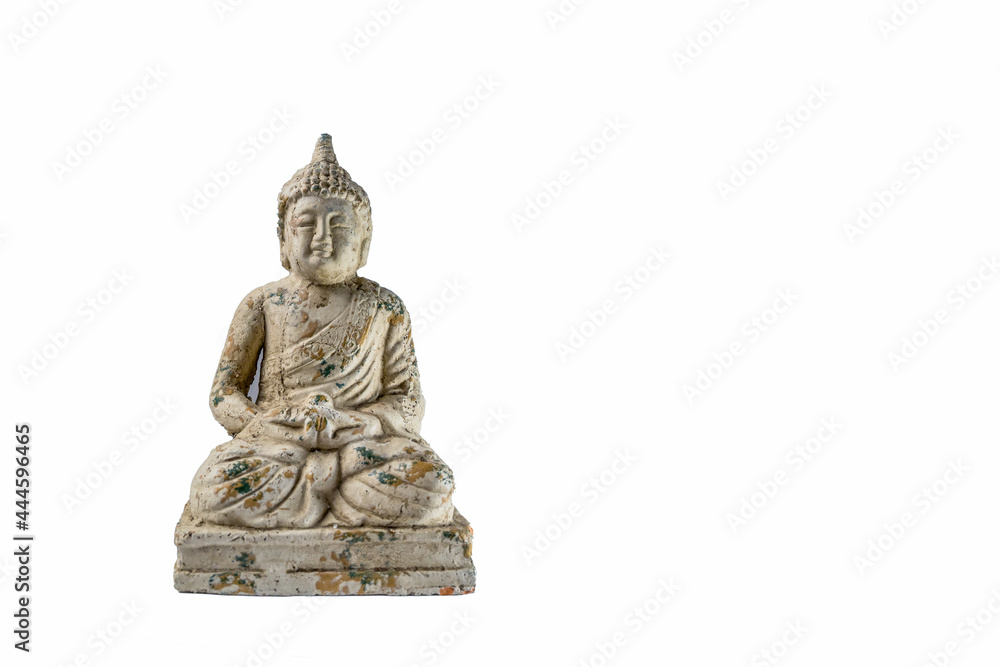 Generic zen stone ancient buddha statue with light shinning on the figure isolated on a white background for copy paste text. Generic zen stone ancient buddha statue with light shinning on the figure isolated on a white background for copy paste text.