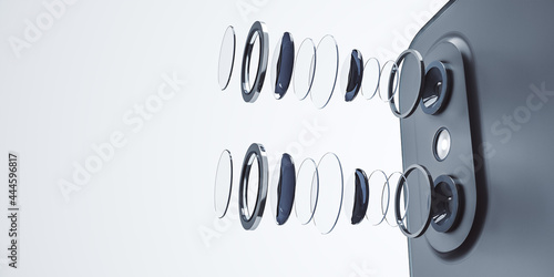 Obraz na plátně Decomposed smartphone camera lens on white background with mock up place for your advertisement