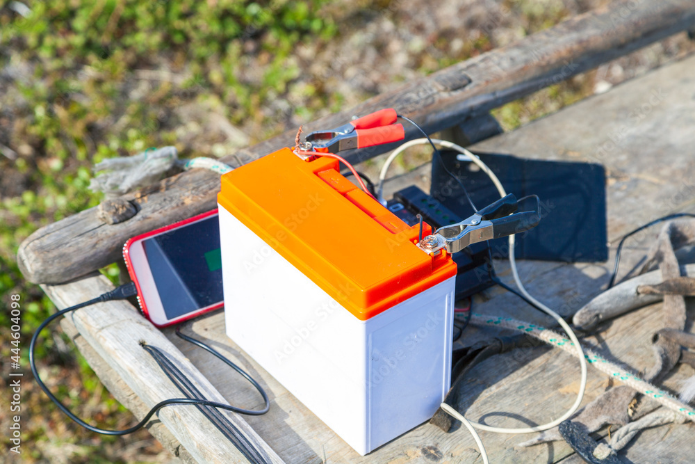 tundra residents use solar panels to charge mobile phones tundra residents use solar panels to charge mobile phones
