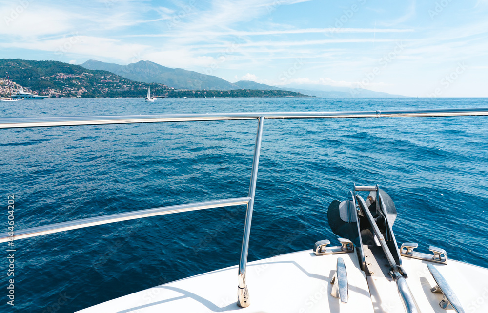 Fototapeta premium Luxury motor yacht in the azure Mediterranean sea at full speed.Expensive yacht.