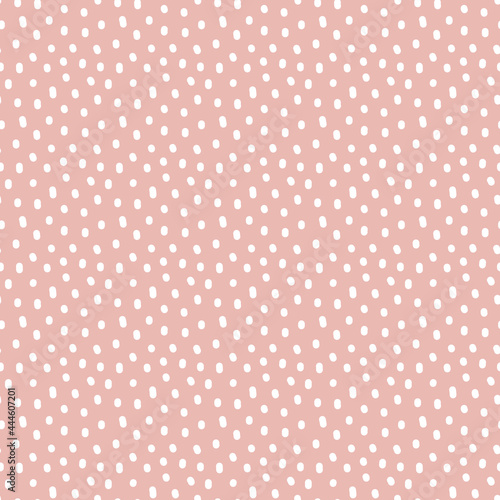 Vintage Polka Dot seamless pattern. White irregular spots, scattered various shape specks on pink background. Abstract vector texture for nursery print design, fashion textile, fabric, scrapbooking