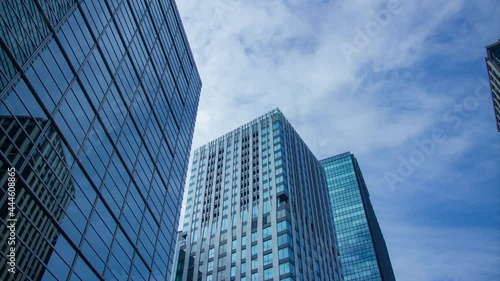 Wallpaper Mural A timelapse of clowd at the building in the business town wide shot tilt Torontodigital.ca