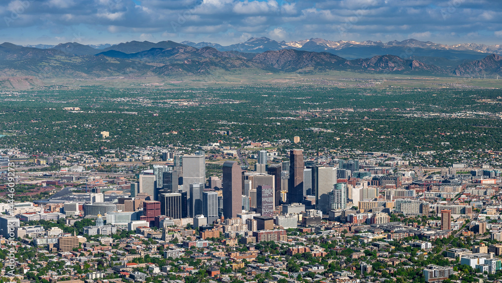 Fototapeta premium Aerial view of Denver Colorado with Rocky mountain backdrop