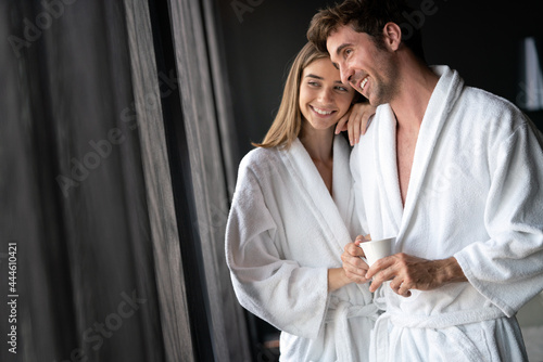 Happy married couple relaxing at wellness spa resort