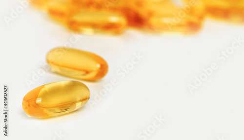 Cod liver oil omega 3 gel capsules isolated on white background. Food supplements for sports