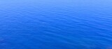 Blue sea water surface. Beautiful blue sea calm background. Blue water surface