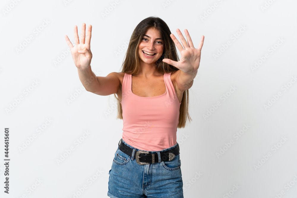Young caucasian woman isolated on white background counting nine with fingers