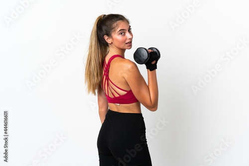 Young caucasian woman isolated on white background making weightlifting