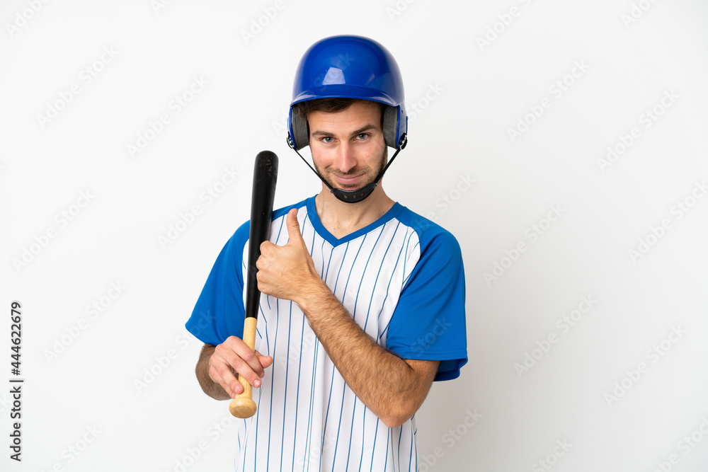 Young caucasian man playing baseball isolated on white background giving a thumbs up gesture Young caucasian man playing baseball isolated on white background giving a thumbs up gesture