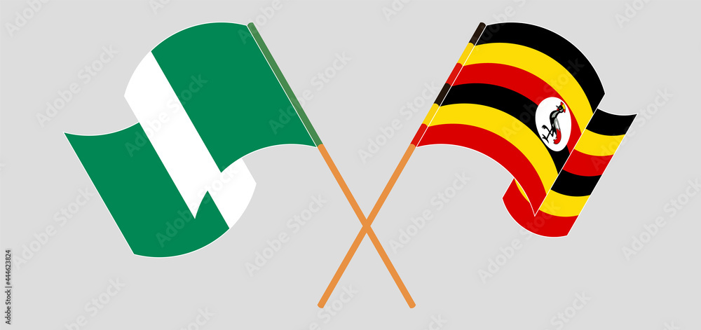 Crossed and waving flags of Nigeria and Uganda Crossed and waving flags of Nigeria and Uganda