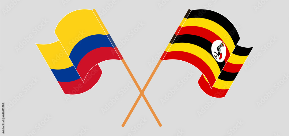 Crossed and waving flags of Colombia and Uganda Crossed and waving flags of Colombia and Uganda