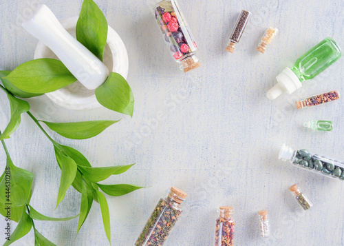 Elements of alternative medicine on a wooden background