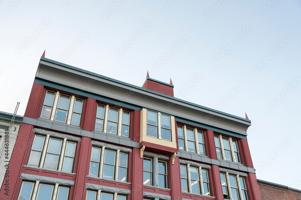 Fototapeta premium Low angle view of a red building with unique design and structure at Tacoma, Washington