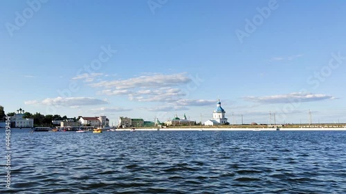 Cheboksary, Chuvashia, Russia - Jule 6, 2021 - View of the city and the Church of the Assumption of the Blessed Virgin Mary