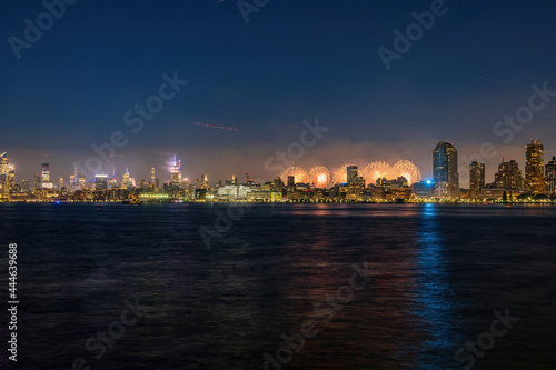 Fireworks celebration of July 4th with the famous Manhattan skyline