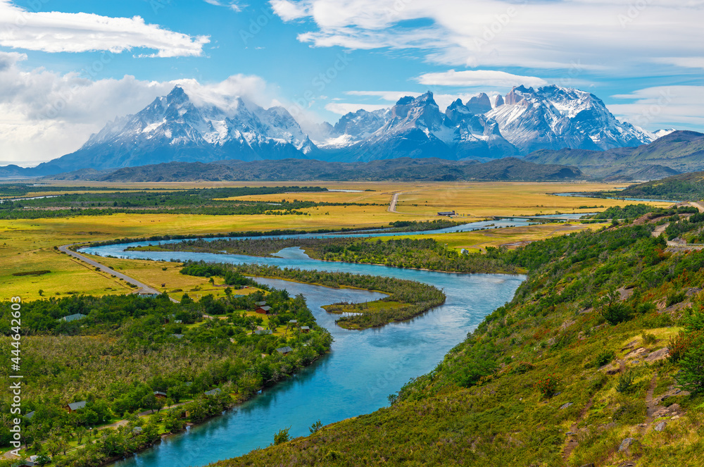 Torres del Paine national park landscape with Cuernos del Paine peaks and Serrano river near Puerto Natales, Patagonia, Chile.