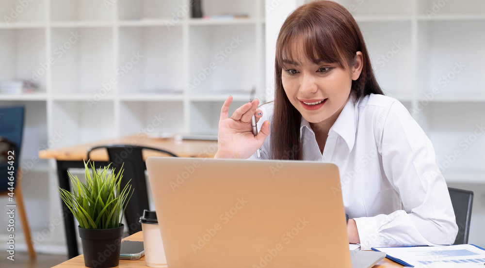 Smiling beautiful woman using digital tablet at home Smiling beautiful woman using digital tablet at home