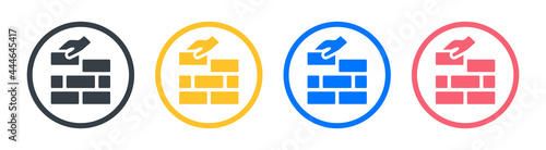 Hand building brick wall icon vector illustration. Construction and builder concept.