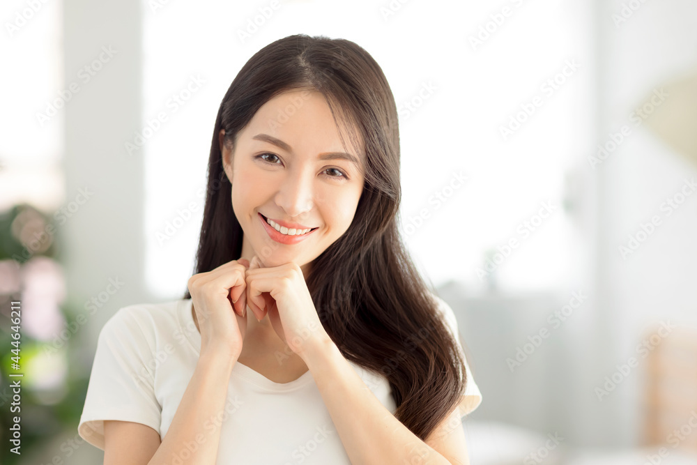 closeup smiling young woman face with clean healthy skin closeup smiling young woman face with clean healthy skin