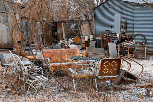 Yard cluttered with junk and trash
