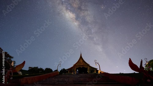 4K video Timelapse on Phu Phrao Temple at night and the Milky Way with noise , grain and dust. Thailand A beautiful temple at night thanks to the fluoresce