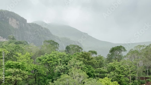 Scenery Of Green Trees And Rocky Mountains In Brahmagiri, Maharashtra, India. wide shot photo