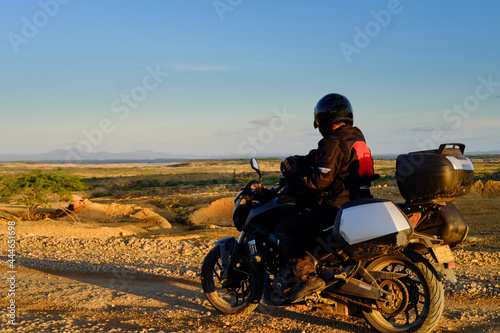 motorcyclist riding in the desert of La Guajira