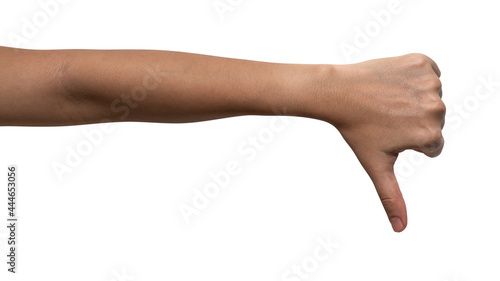 Woman hand showing thumbs down sign isolated on white background.