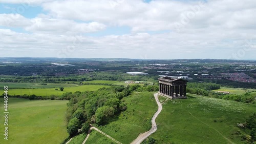 Aerial view of Penshaw Monument in Sunderland, Tyne and Wear, North East England. 4K HD drone footage panning around historical monument. photo