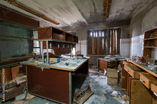 abandoned laboratory room with shelving