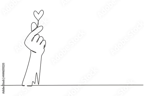 Single continuous line drawing Korean heart sign. Finger love symbol. I love you hand gesture. Self love. Korean heart design. Love with hand gestures. One line draw graphic design vector illustration