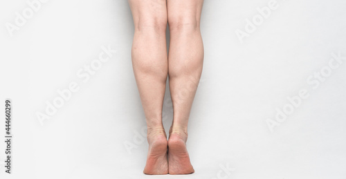 tiptoed people showing his strong gastrocnemius
