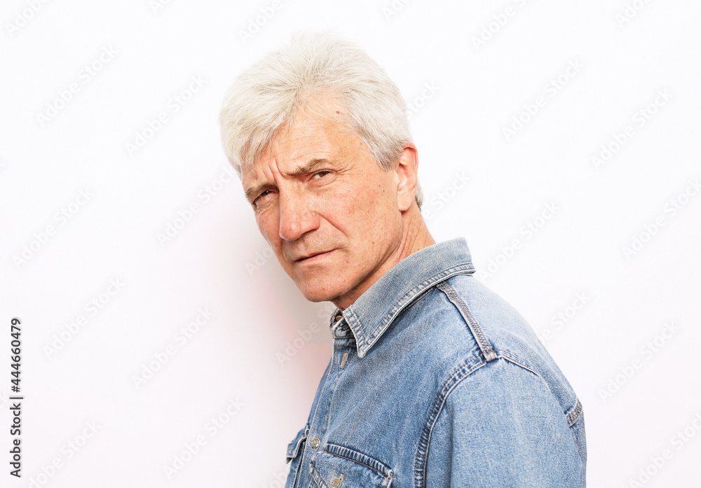 Old people, emotion and modern lifestyle concept. Senior man with gray hair Old people, emotion and modern lifestyle concept. Senior man with gray hair