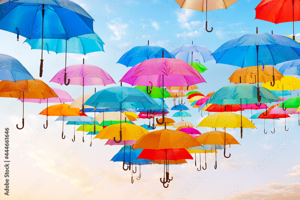 Colorful umbrellas in the sky.