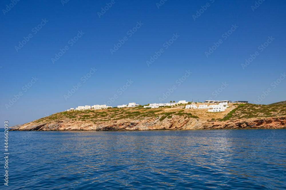 Antiparos island, Greece - June 2017: Beautiful seascape view travelling to Antiparos island as the boat approaches the port. Panoramic summer scenery in Greece at Antiparos island, Cyclades, Greece