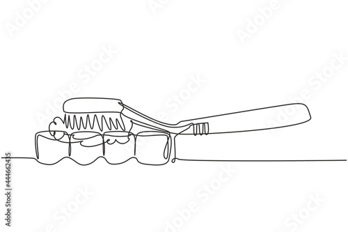 Single one line drawing toothbrush being used to brush teeth. Healthy activity in morning for family members. Oral and dental health concept. Continuous line draw design graphic vector illustration