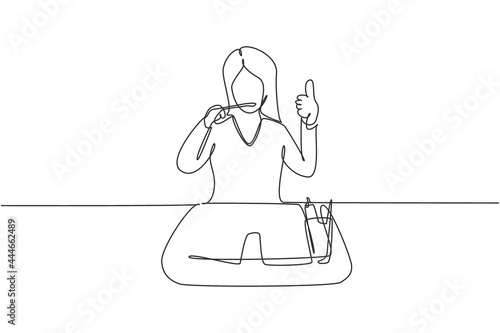 Continuous one line drawing woman brushing her teeth with thumbs up gesture. Routine habits for cleanliness, health, freshness of mouth and teeth. Single line draw design vector graphic illustration