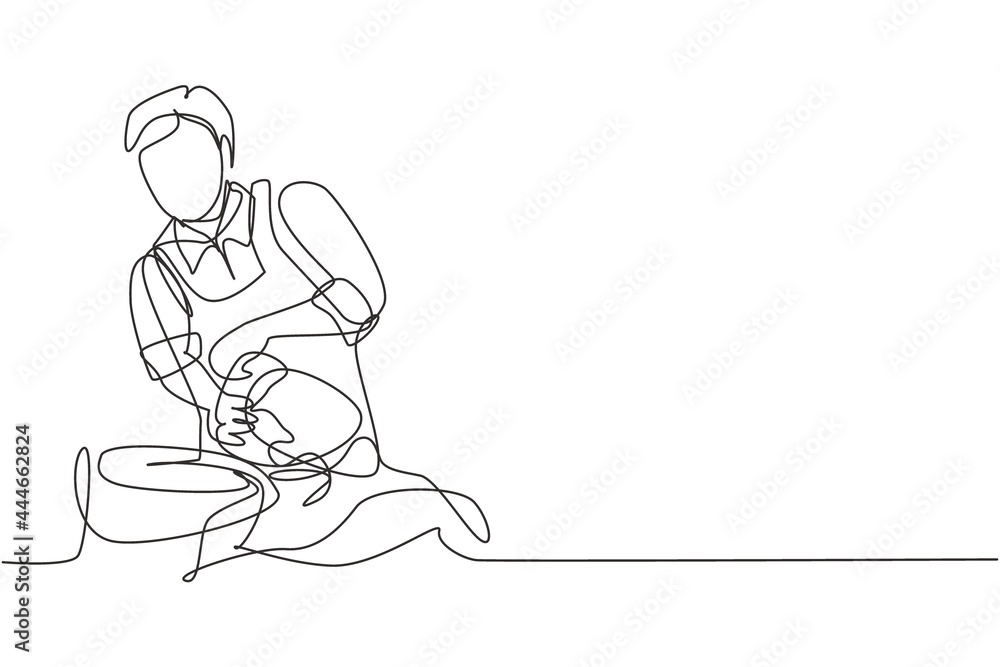 Continuous one line drawing attractive male is getting modern haircut in barber shop. Top view of young man getting his hair washed and his head massaged in hair salon. Single line draw design vector