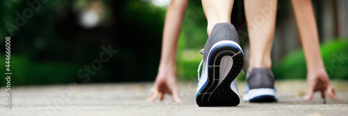 Athlete runner Start point feet running on close-up on shoe.