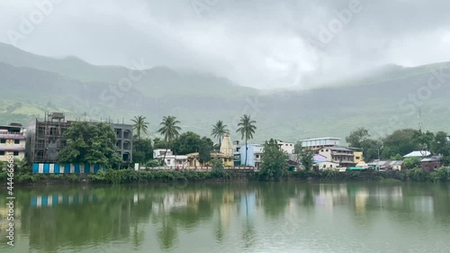 Distant View Of Shri Gaytridevi Mandir Temple During Cloudy Day At Trimbak City, Maharashtra, India. wide shot photo