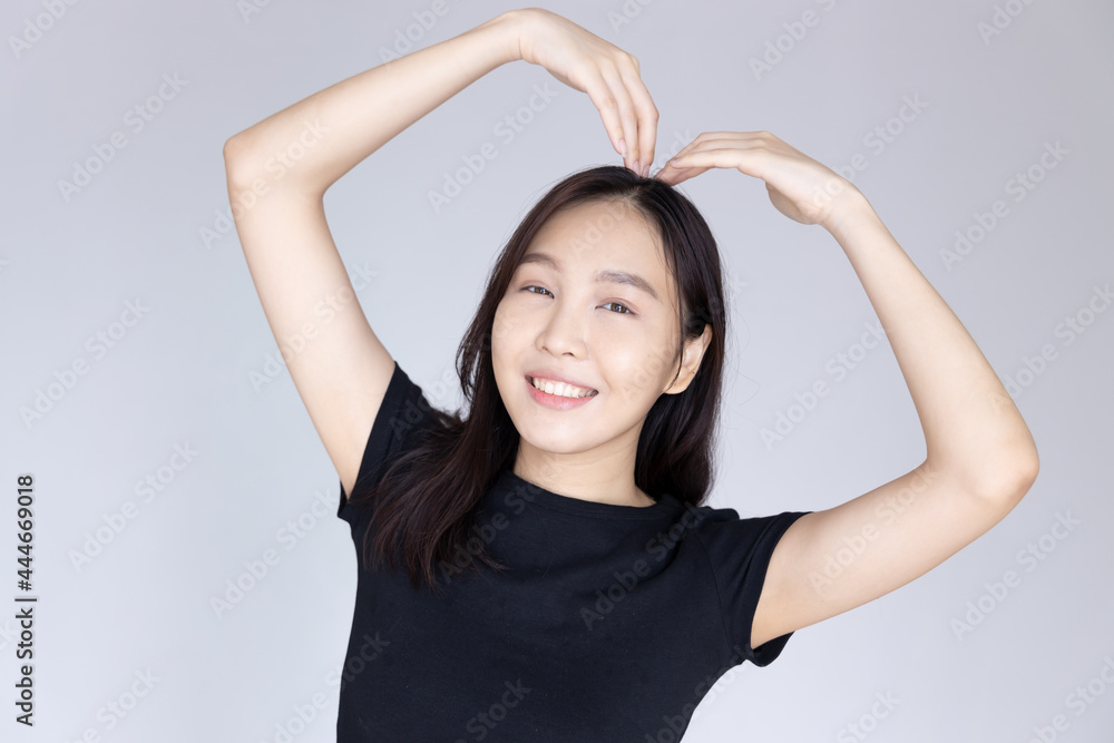 woman with heart gesture, concept of heart disease awareness, heart care, heart attack awareness day or month woman with heart gesture, concept of heart disease awareness, heart care, heart attack awareness day or month